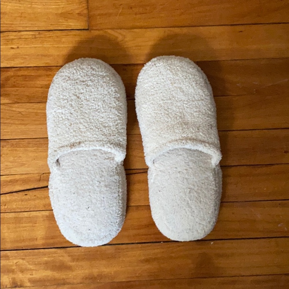 White furry vibrating slippers